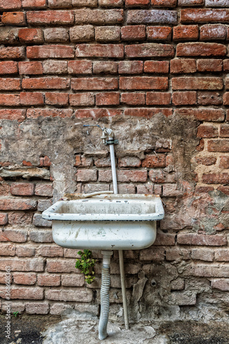 Houses in Old Tbilisi, Wash basin on a wall, Georgia, Caucasus, Middle East, Asia photo