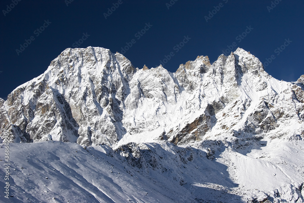 Blue sky over mountains after snowfall, Himalayas, Nepal