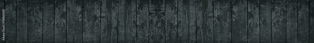 Obraz premium Dark gray wood background. Old shabby wooden planks. Black grunge background. Long banner with vintage planks texture.