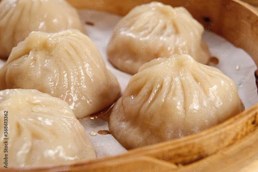 Close-up Of The Pork Buns Steamed In Bamboo Steamers Close-up Of The Pork Buns Steamed In Bamboo Steamers