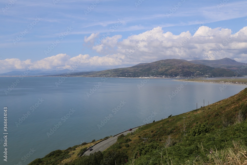 A high view across Cardigan Bay to Barmouth, the Llyn Peninsula and Snowdonia, Wales, UK.