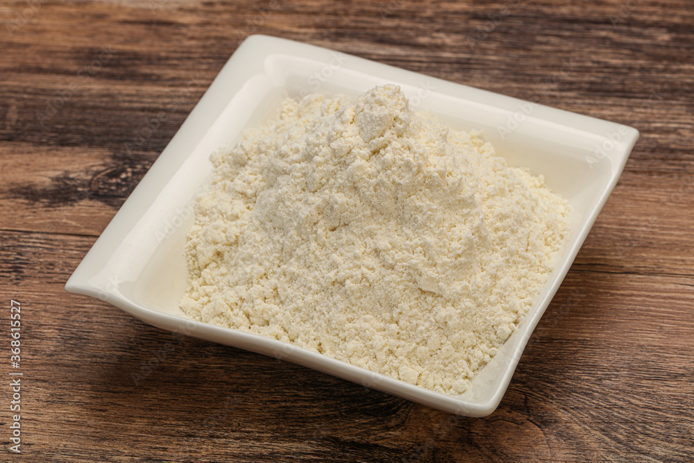 Wheat flour heap in the bowl Wheat flour heap in the bowl