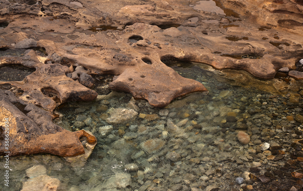 Gran Canaria, Textures of rocks at El Confital beach on the edge of Las Palmas Gran Canaria, Textures of rocks at El Confital beach on the edge of Las Palmas