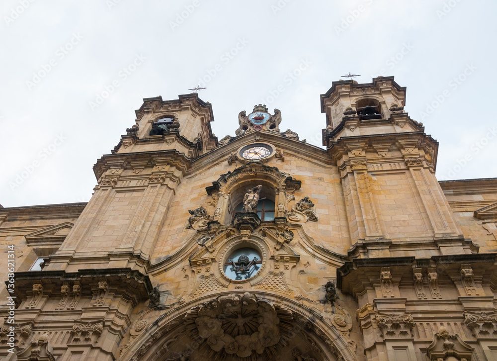 Beautiful low angle shot of the Basilica of Saint Mary of the Chorus (San Sebastian, Donostia,  Basque Autonomous Community, Spain). Typical architecture.