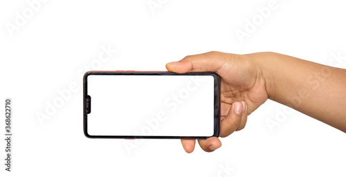 The hand is holding the white screen, the mobile phone is isolated on a white background.