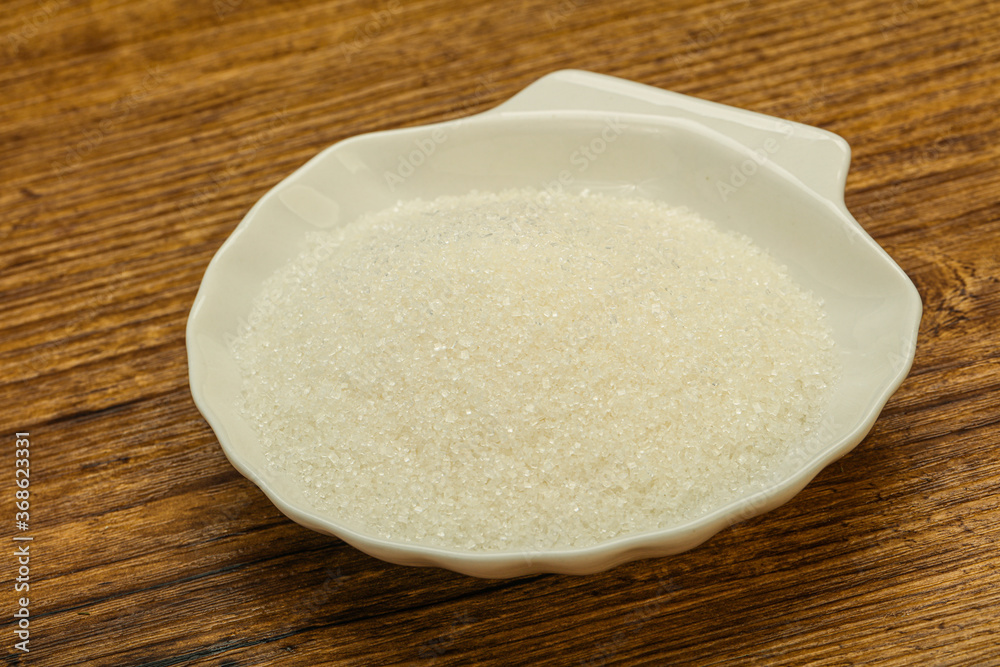 White sugar in the bowl