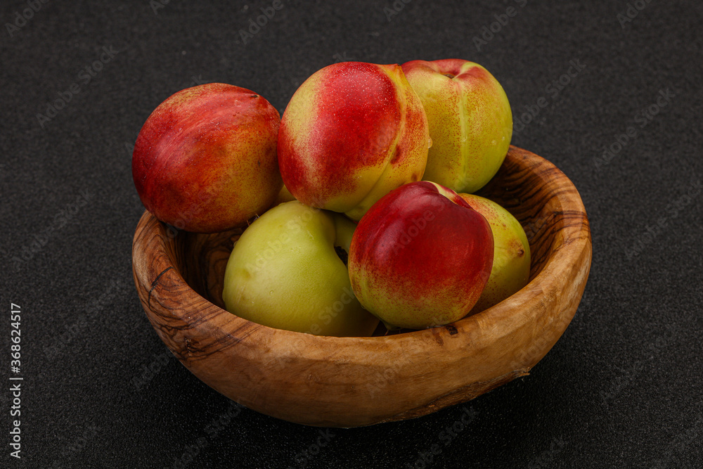 Sweet small nectarines in the basket Sweet small nectarines in the basket