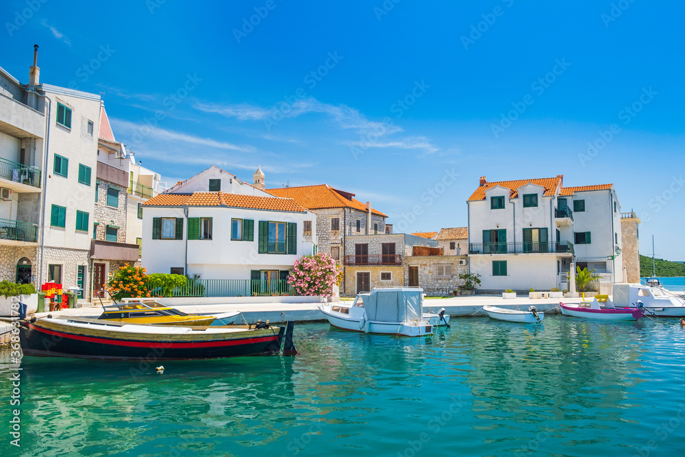 Boats in marina in old town of Pirovac on Adriatic coastline in Croatia