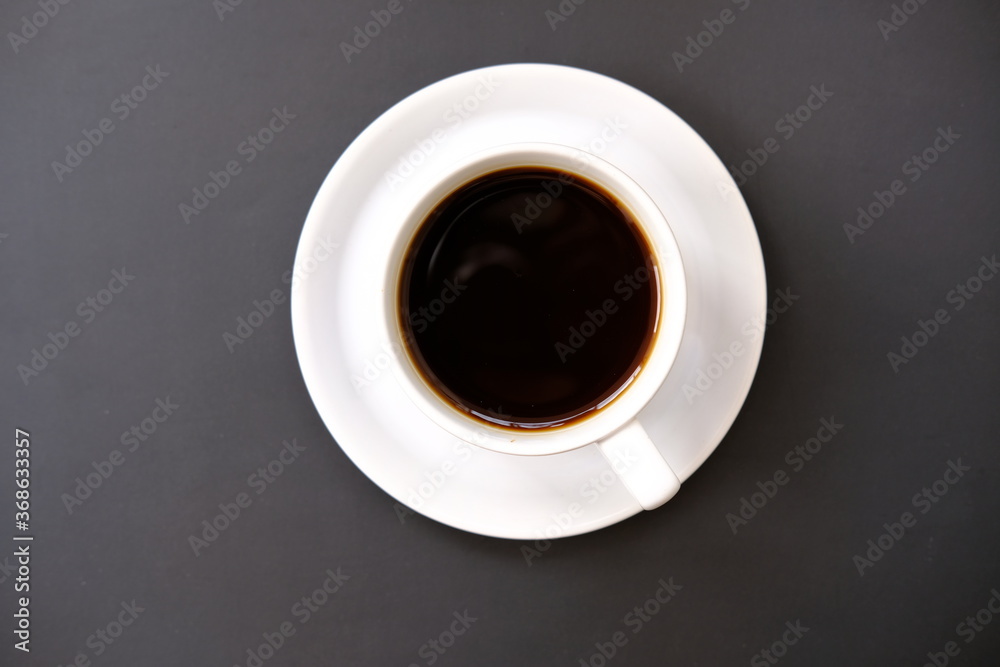 cup of coffee on wooden table cup of coffee on wooden table