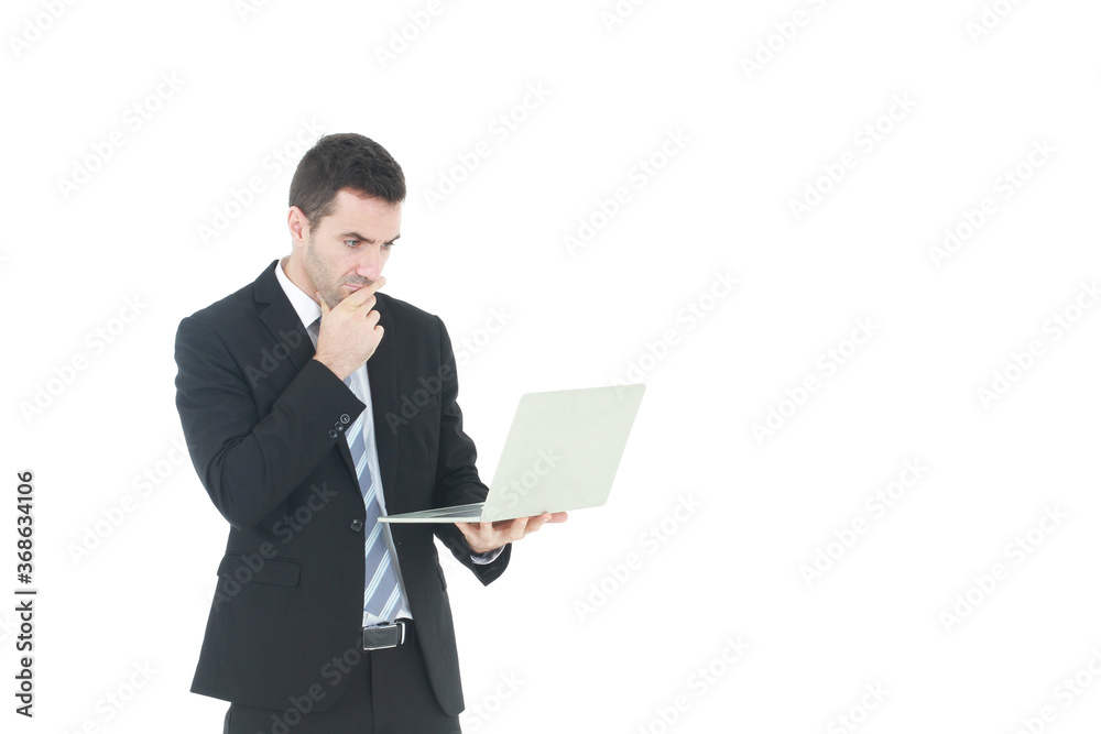 Successful and handsome businessman in a suit smiling with hand holding notebook. He serious in working on a laptop isolated on white background. Copy space Successful and handsome businessman in a suit smiling with hand holding notebook. He serious in working on a laptop isolated on white background. Copy space