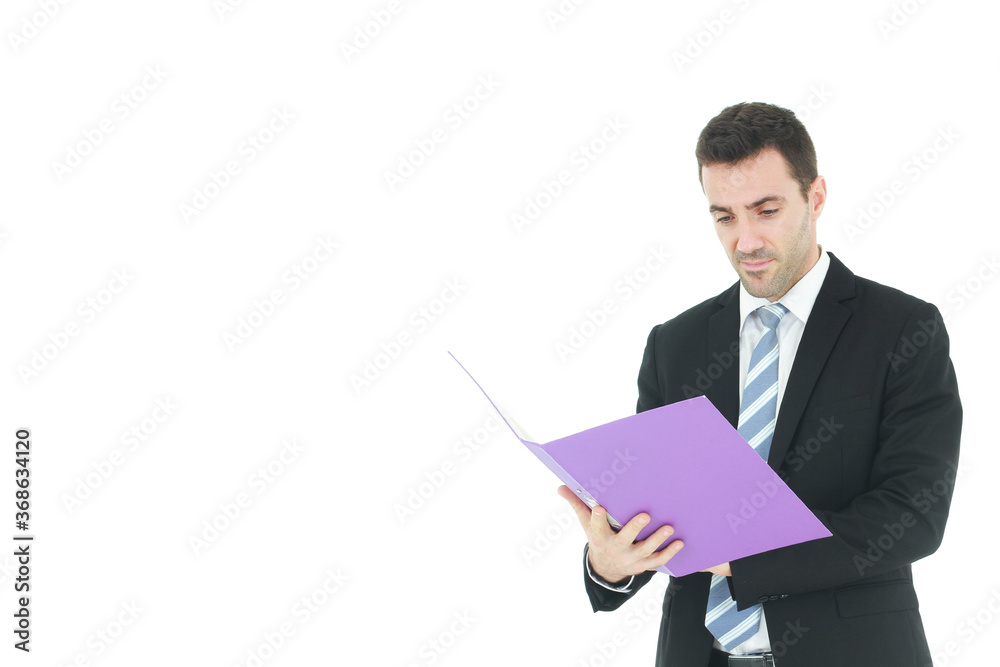 Handsome Caucasian man in black suit holding violet document file and serious in work isolated on white background. Handsome Caucasian man in black suit holding violet document file and serious in work isolated on white background.