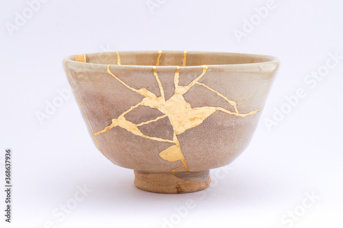 Antique kintsugi, tea pottery set chawan bowl restored with gold.