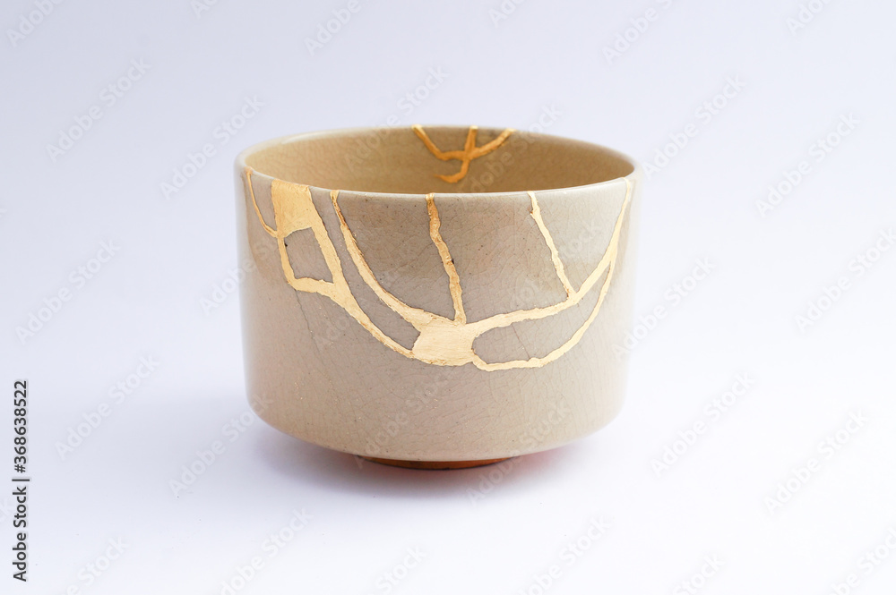 Antique Beige Japanese kintsugi bowl, restored with gold.
Antique traditional handmade pottery. Antique Beige Japanese kintsugi bowl, restored with gold.
Antique traditional handmade pottery.