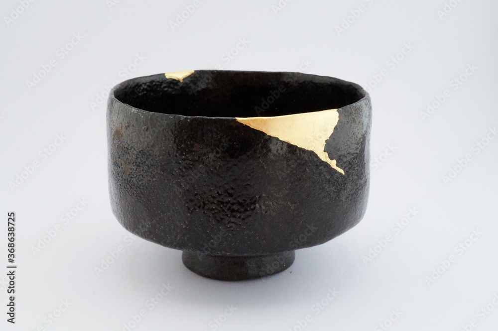 Antique Broken Japanese Raku Black Bowl Repaired With Gold Kintsugi  Technique Stock Photo - Download Image Now - iStock