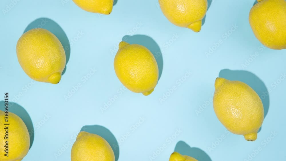 Lemon moves on the blue background - Stop motion animation - Seamless pattern with lemons
Lemon moves on the blue background - Stop motion animation - Seamless pattern with lemons