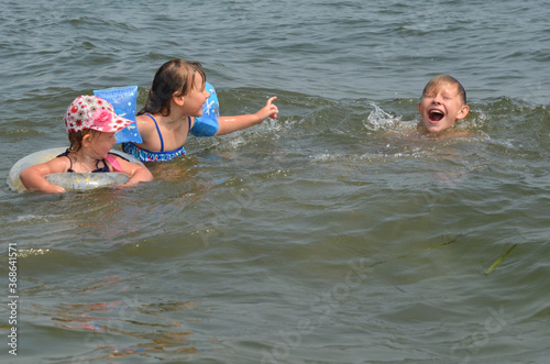 Caucasian children in the sea on the beach in summer © Marina Shvedak