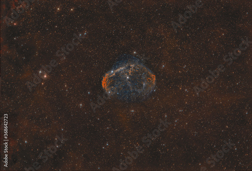 Crescent nebula in Red Sky