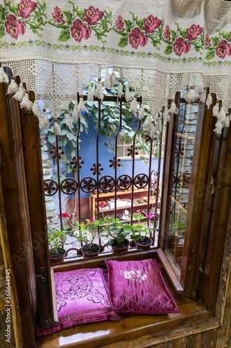 The historical mudbrick house window from the Ottoman period in the 700 year old Cumalı Kızık village. photo