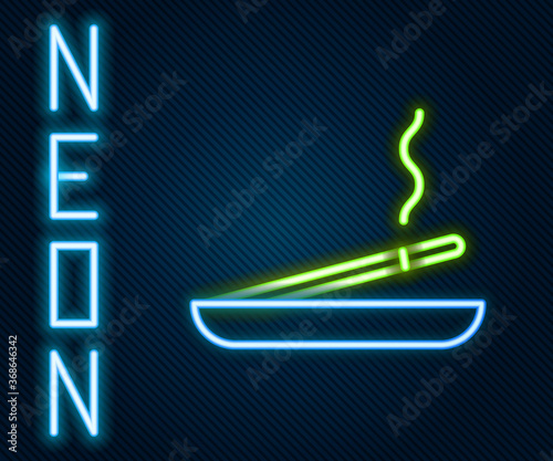 Glowing neon line Scented spa stick on a wooden stand icon isolated on black background. Incense stick. Cosmetic procedure aromatherapy. Colorful outline concept. Vector Illustration.