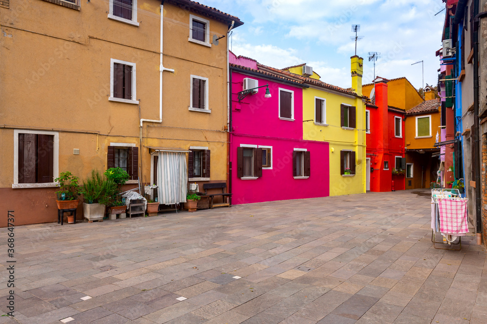 Facades of traditional old houses on the island Burano.