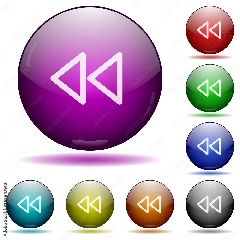 Media fast backward icon in glass sphere buttons Media fast backward icon in glass sphere buttons