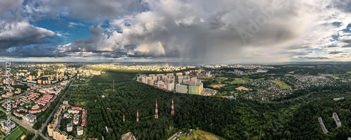 Panorama of modern urban areas near the forest