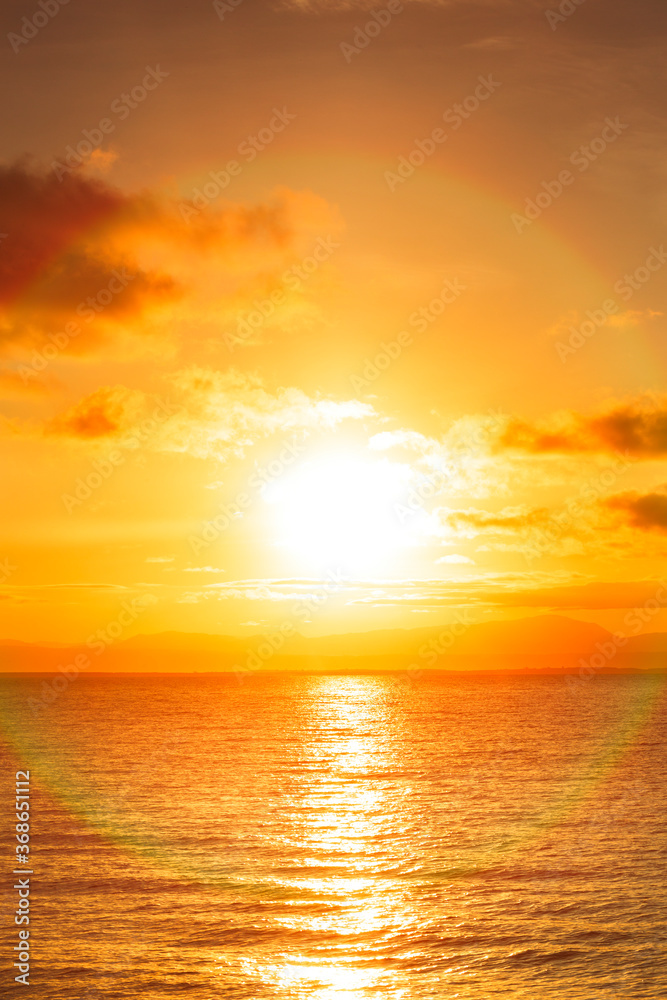 sunrise is shining over the sea