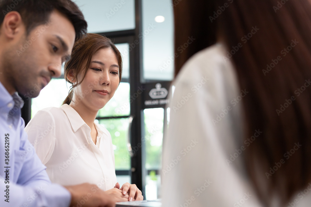 Asian business man and women meeting and talk about job in office. Asian business man and women meeting and talk about job in office.
