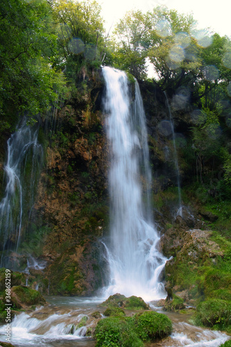 Gostilije waterfall falling from rock in Zlatibor resort of Western Serbia
