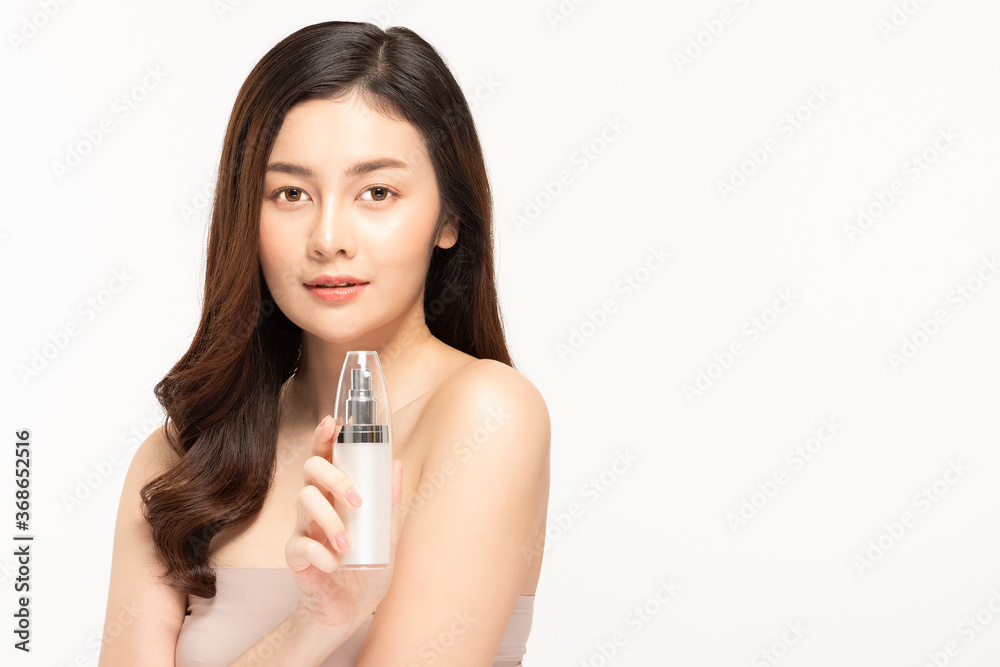 Beauty asian woman hold bottle cosmetic cream lotion and cheerful. Beauty asian woman hold bottle cosmetic cream lotion and cheerful.
