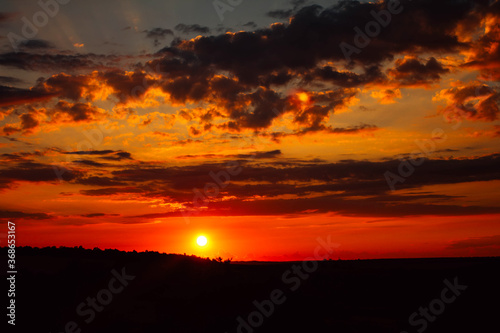 sunset in the valley, beautiful clouds and sun