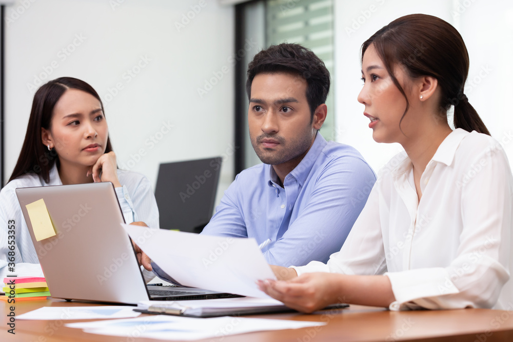 Asian business man and women meeting and talk about job in office. Asian business man and women meeting and talk about job in office.