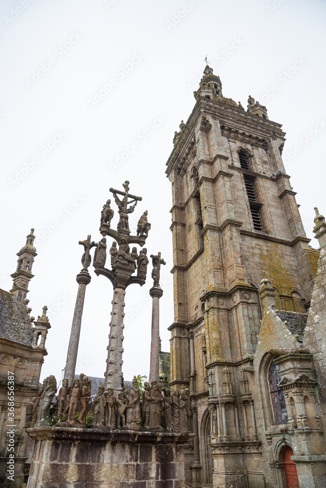 Parish close (parish church elaborately decorated with sculpture groups and surrounded by an entirely walled churchyard) in Saint-Thegonnec, Finistere, Brittany, France.