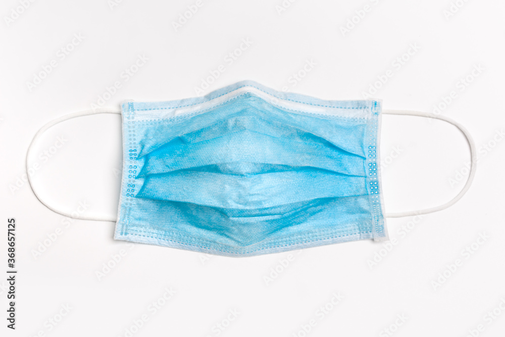 Surgical mask with white background. Medical mask with isolated background. Face mask for against the corona virus, covid-19. Single mask. Surgical mask with white background. Medical mask with isolated background. Face mask for against the corona virus, covid-19. Single mask.