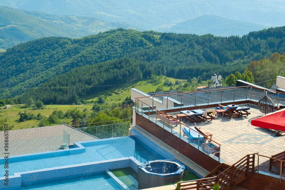 Obraz premium Swimming pool with amazing mountain view in Kopaonik resort, Serbia