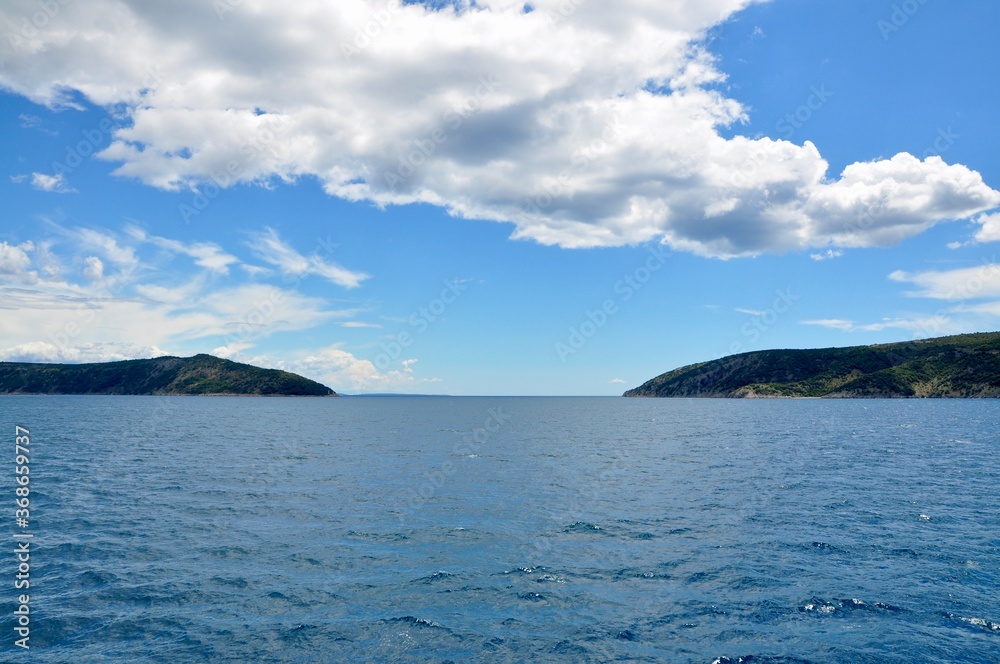 Adriatic Sea, sea corridor between two island and sky Adriatic Sea, sea corridor between two island and sky