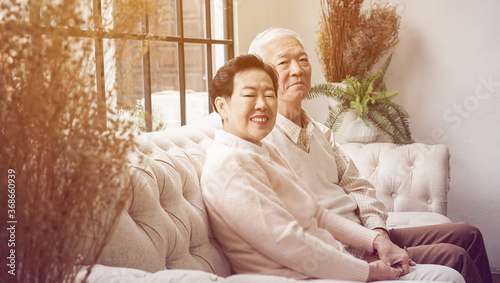 Rich Asian senior elder couple stay home for lockdown together well being family