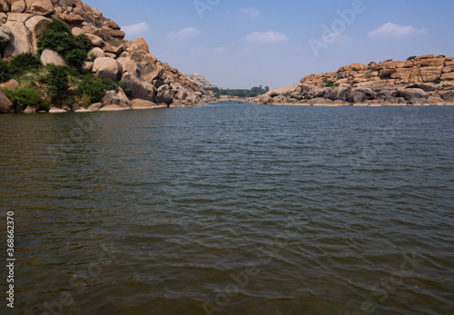 The beautiful flowing Tungabhadra river in Hampi,Karnataka, India photo