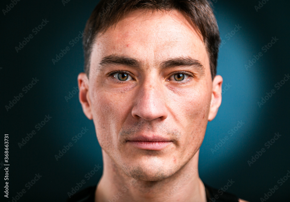 Fototapeta premium Close up studio headshot portrait of young caucasian man stand look at camera posing, feel positive optimistic