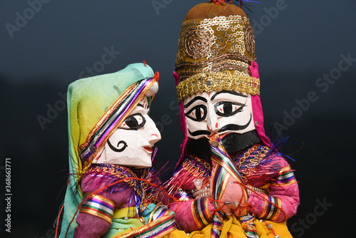 Indian handicraft, handmade puppet attached string, King and queen Rajasthan India. Dolls men and women face wearing traditional dress saree, sari, Kurta for plays, Dussehra, Dasara, Diwali festival