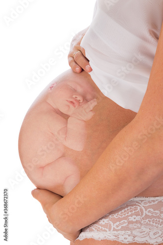 Unborn baby in pregnant belly
