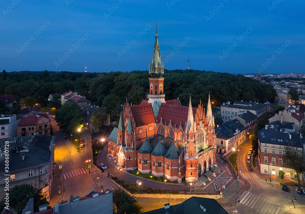 Aerial view of Gothic Saint-Joseph church at dusk in Krakow, Poland

