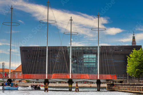 Photography Photo of Copenhagen tourist landmark spot taken during a boat ride across the city canals, on a hot summer day with bright sky