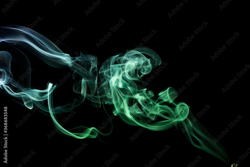 Smoke from an incense stick. Smoke from an incense stick.