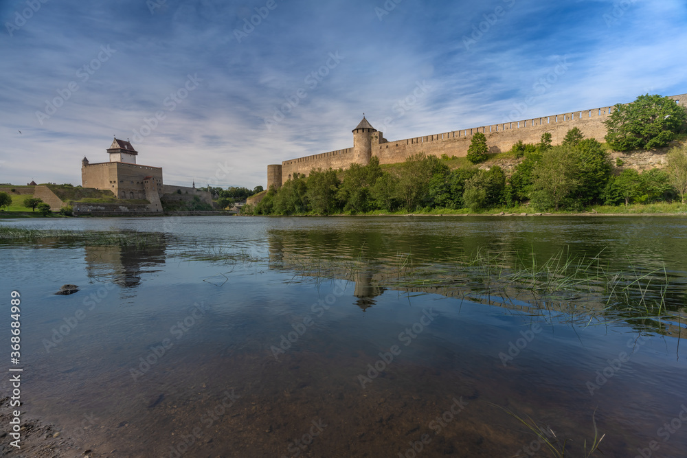 Narva, on the Narva river, at the eastern extreme point of Estonia, at the Russian border. The Narva Castle towers over the Estonian side, while Ivangorod Fortress sprawls across the Russian bank.