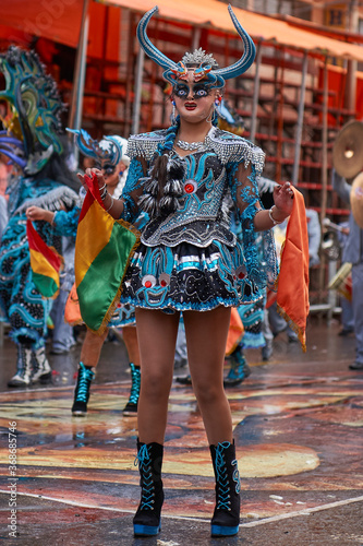 Diablada dancers in ornate costumes parade through the mining city of Oruro on the Altiplano of Bolivia during the annual carnival.