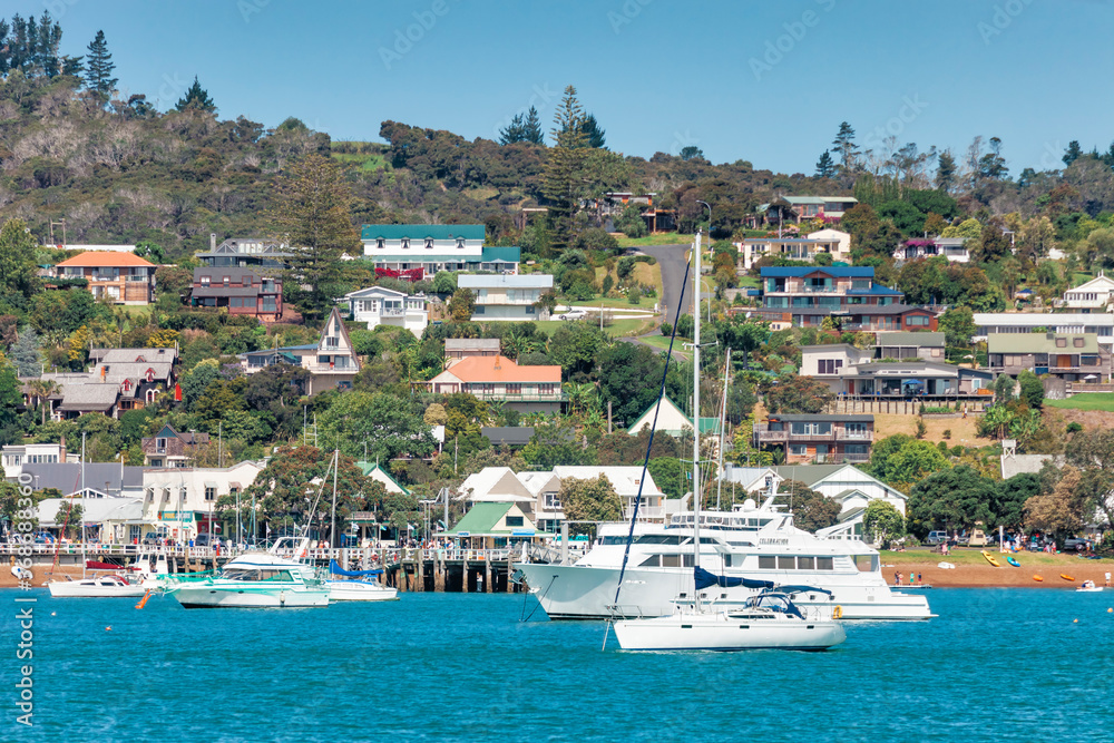 View of Russell in Bay of Islands with residential buildings and boats  - Panorama in Northland, North Island, New Zealand