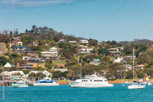 View of Russell in Bay of Islands with residential buildings and boats - Panorama in Northland, North Island, New Zealand