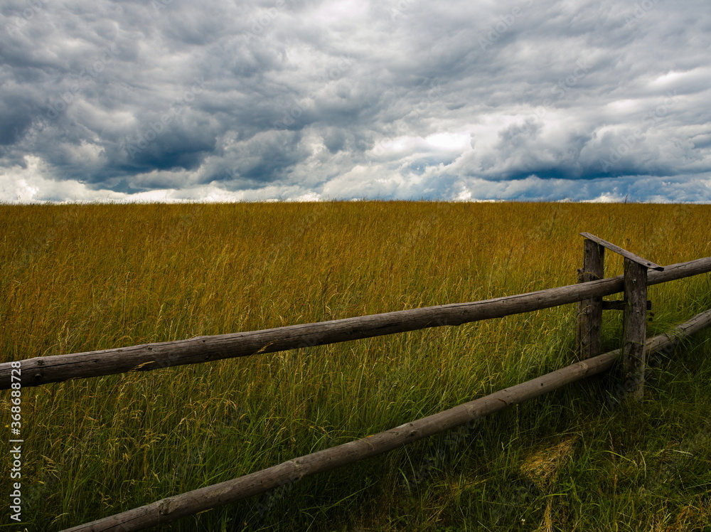 Rural landscape with fence. Hill Majerz. Pieniny National Park. Czorsztyn. Poland Rural landscape with fence. Hill Majerz. Pieniny National Park. Czorsztyn. Poland