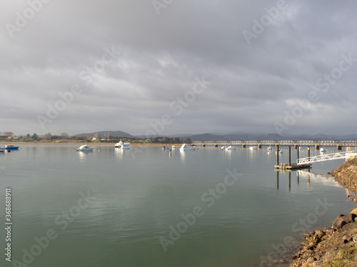 Boats In The Harbour With Rail Bridge In Background © mcgimpseymike